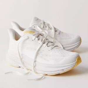 Hoka White and Gold Athletic Shoes